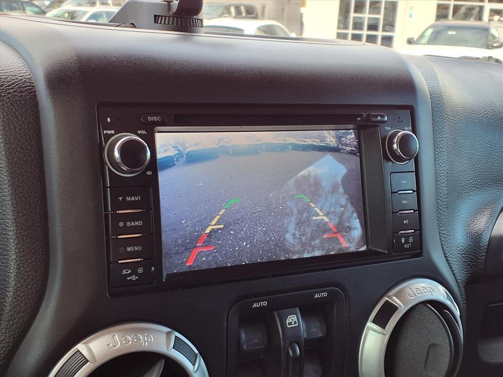 used 2015 Jeep Wrangler Unlimited car, priced at $19,558