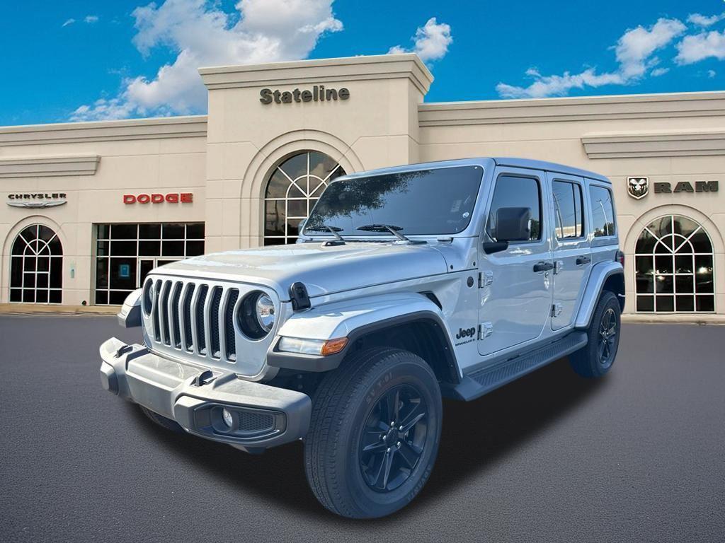 used 2023 Jeep Wrangler car, priced at $34,395