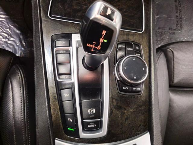 used 2014 BMW 750 car, priced at $13,620