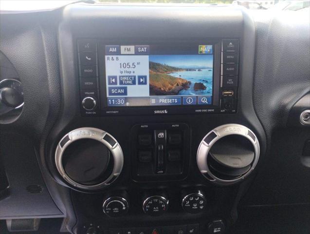 used 2012 Jeep Wrangler Unlimited car, priced at $16,395