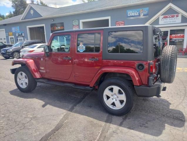 used 2012 Jeep Wrangler Unlimited car, priced at $16,395