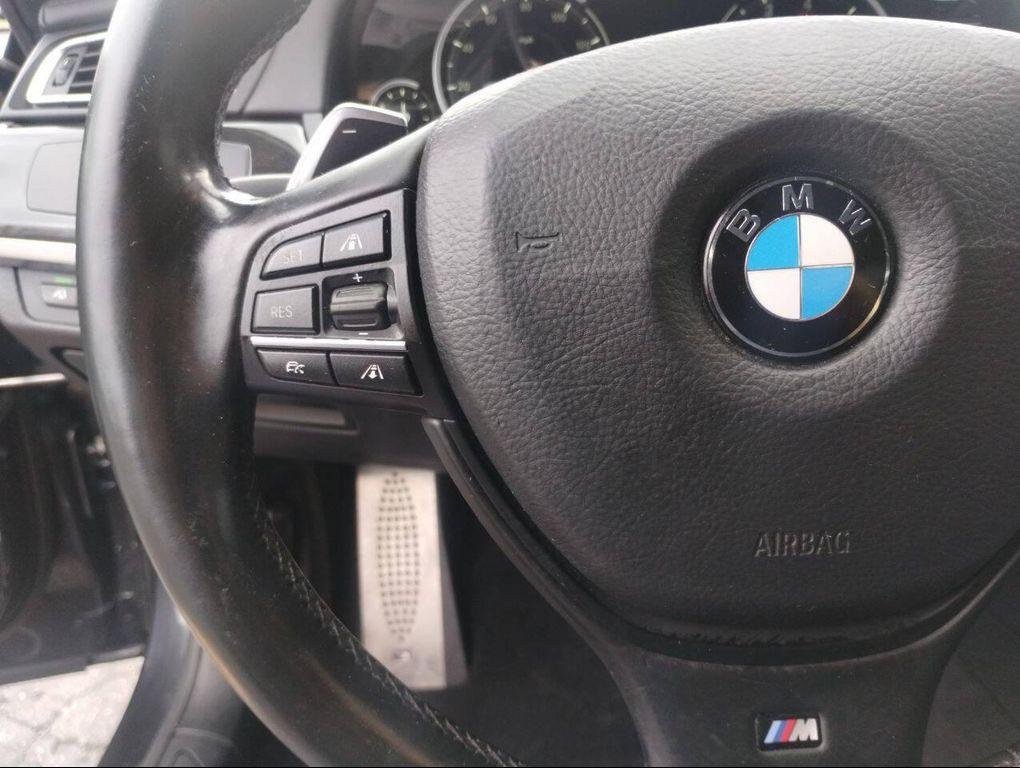 used 2015 BMW 750 car, priced at $14,150
