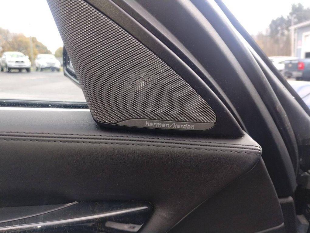 used 2015 BMW 750 car, priced at $14,150