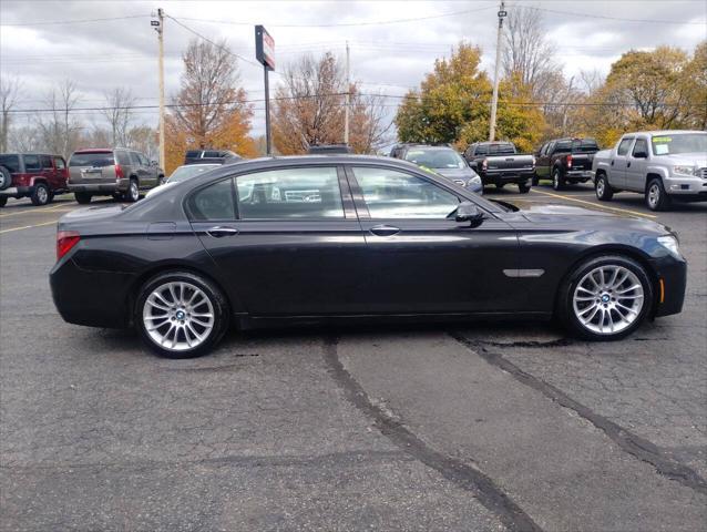 used 2015 BMW 750 car, priced at $18,395