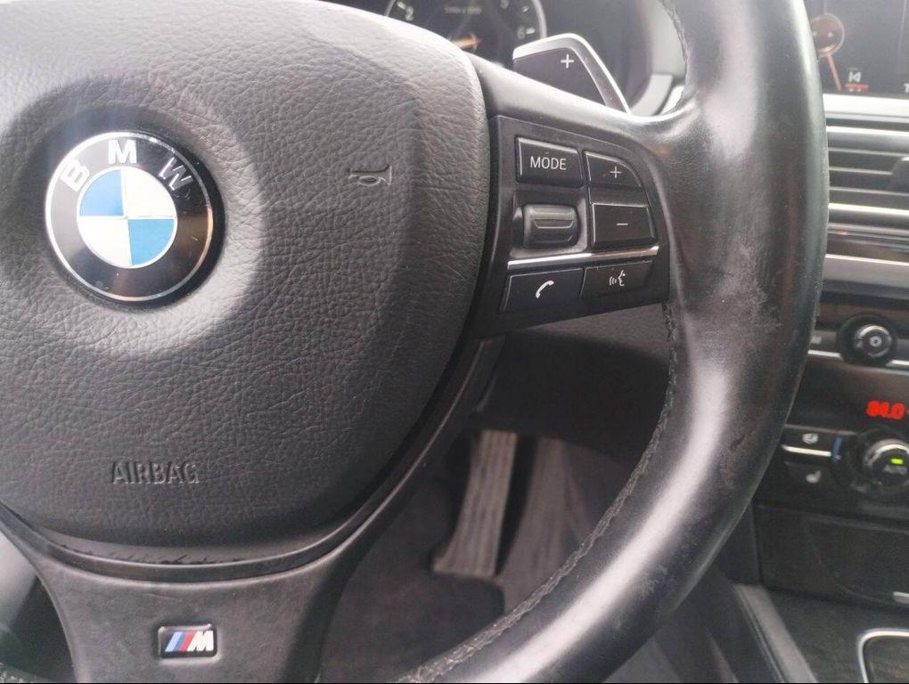 used 2015 BMW 750 car, priced at $14,150