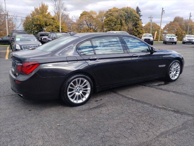 used 2015 BMW 750 car, priced at $18,395