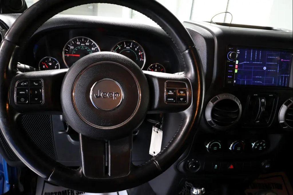 used 2011 Jeep Wrangler Unlimited car, priced at $14,450