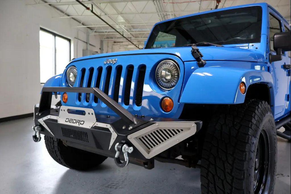 used 2011 Jeep Wrangler Unlimited car, priced at $14,450