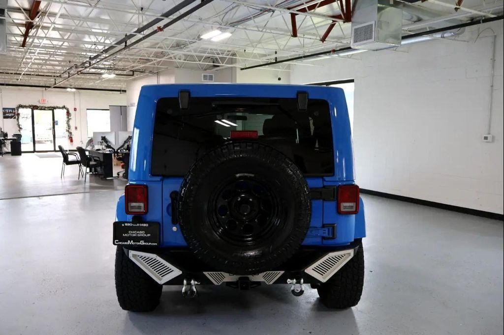used 2011 Jeep Wrangler Unlimited car, priced at $14,450