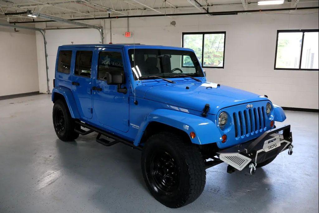 used 2011 Jeep Wrangler Unlimited car, priced at $14,450