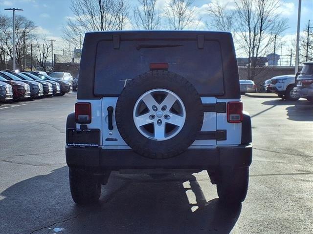 used 2018 Jeep Wrangler JK Unlimited car, priced at $21,437