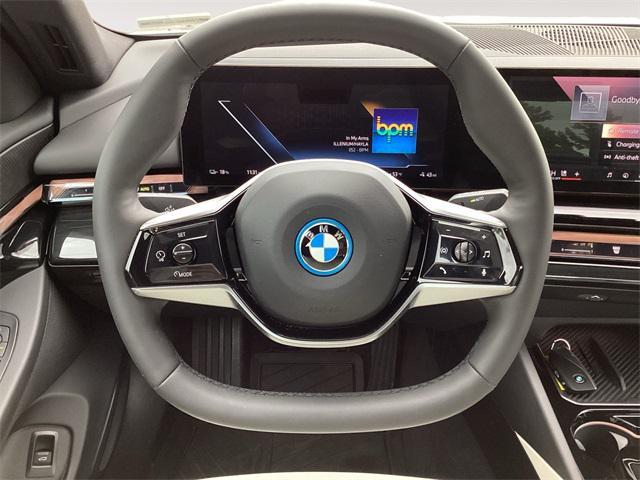 used 2025 BMW i5 car, priced at $58,901