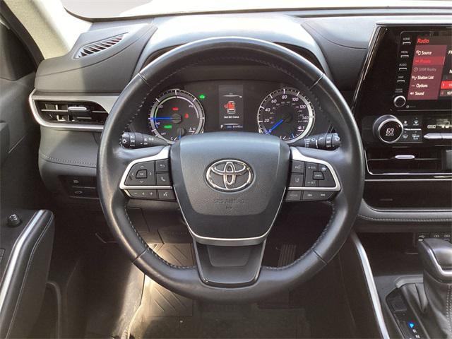 used 2022 Toyota Highlander Hybrid car, priced at $31,460