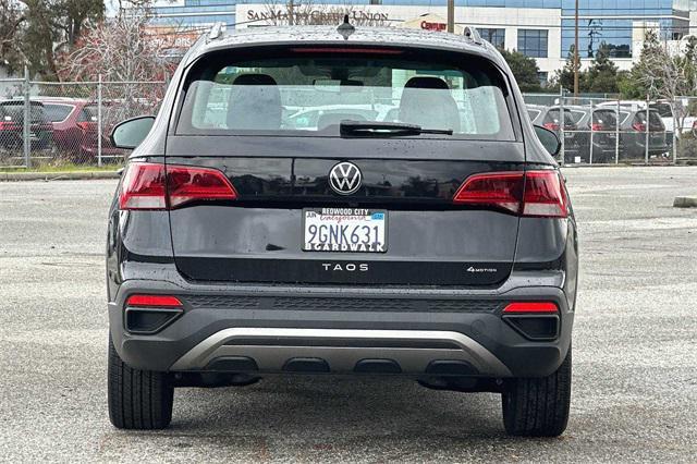 used 2023 Volkswagen Taos car, priced at $24,555