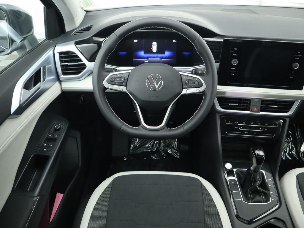 new 2025 Volkswagen Taos car, priced at $30,290
