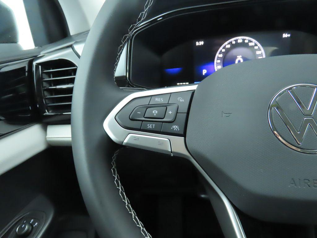 used 2025 Volkswagen Taos car, priced at $21,500