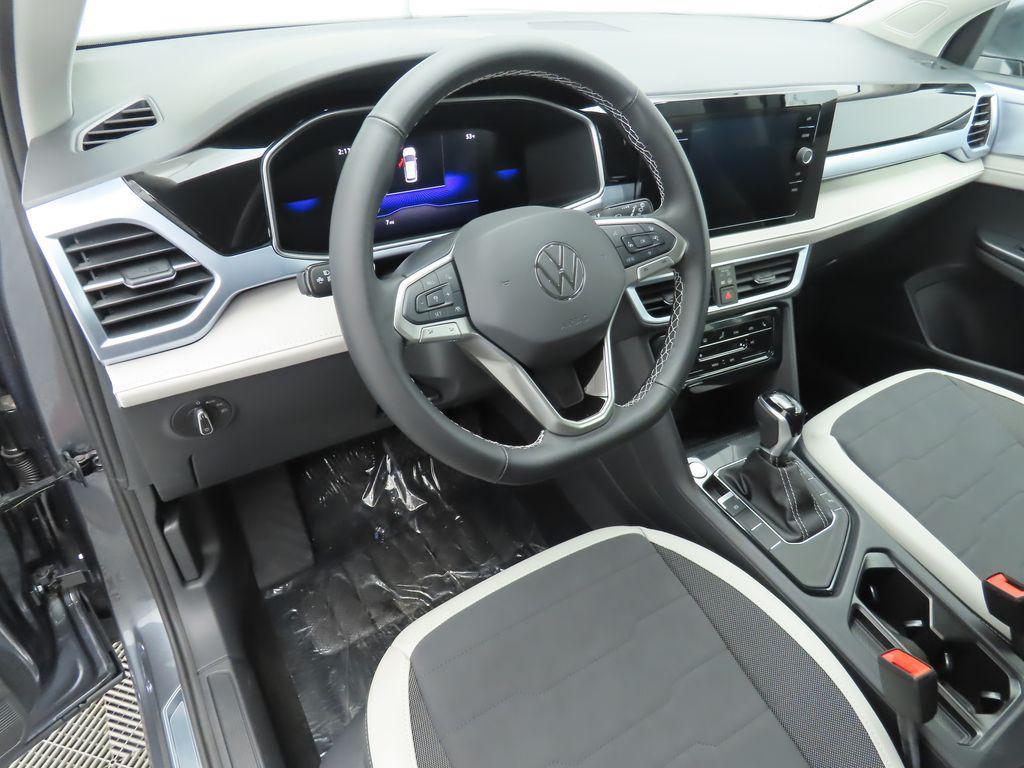 used 2025 Volkswagen Taos car, priced at $25,700