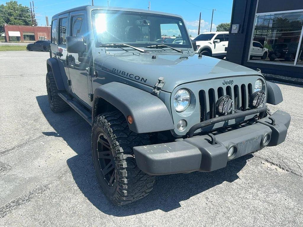 used 2014 Jeep Wrangler Unlimited car, priced at $21,215