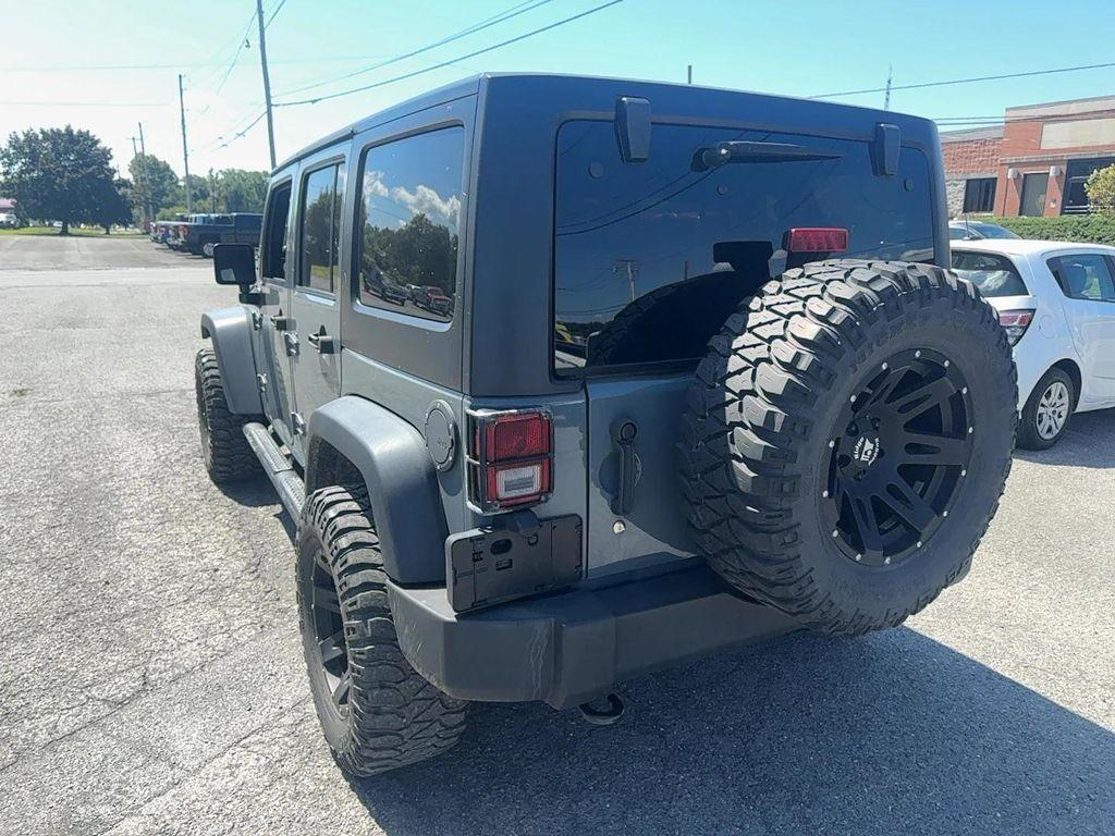 used 2014 Jeep Wrangler Unlimited car, priced at $21,215