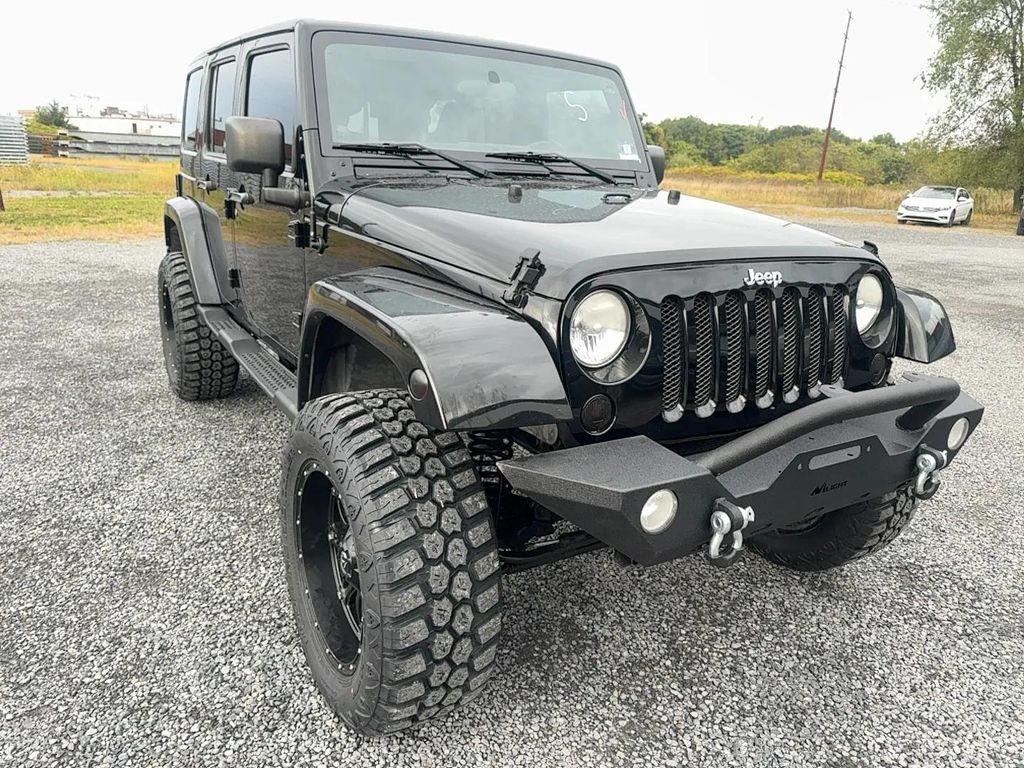 used 2012 Jeep Wrangler Unlimited car, priced at $18,956