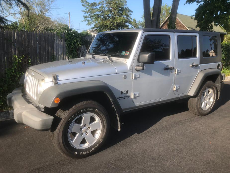 used 2009 Jeep Wrangler Unlimited car, priced at $16,500