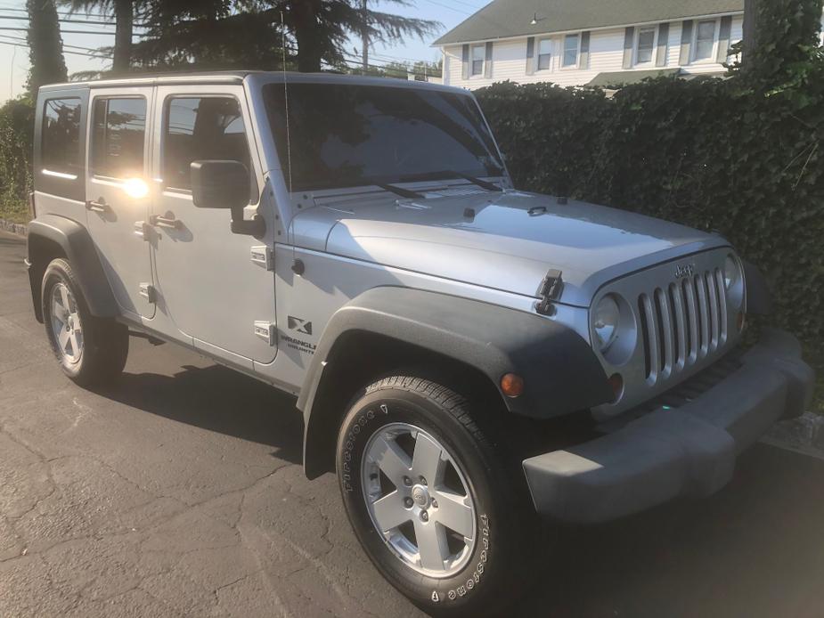 used 2009 Jeep Wrangler Unlimited car, priced at $16,500