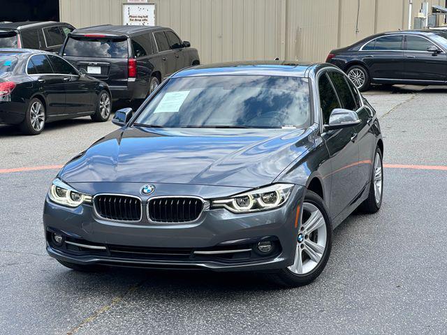 used 2018 BMW 330 car, priced at $17,262