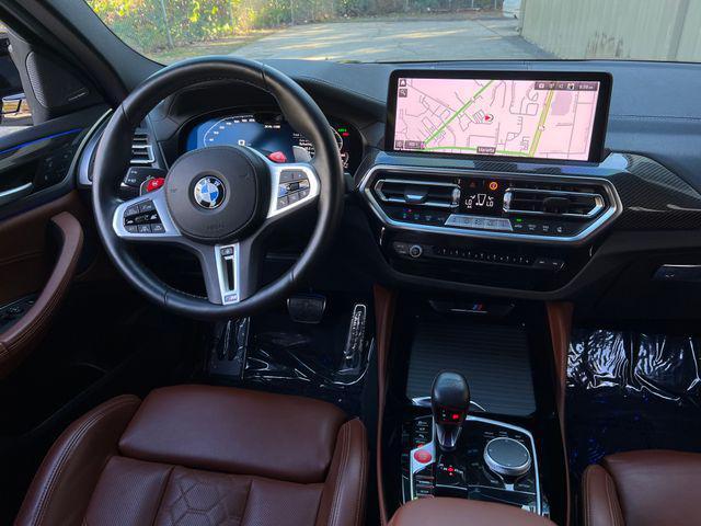 used 2024 BMW X4 M car, priced at $75,900