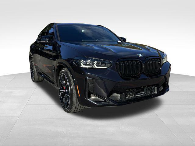 used 2024 BMW X4 M car, priced at $75,900