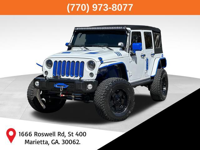 used 2015 Jeep Wrangler Unlimited car, priced at $21,900