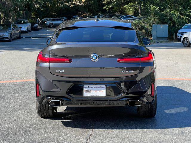 used 2022 BMW X4 car, priced at $37,900