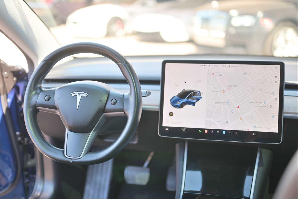 used 2019 Tesla Model 3 car, priced at $20,555