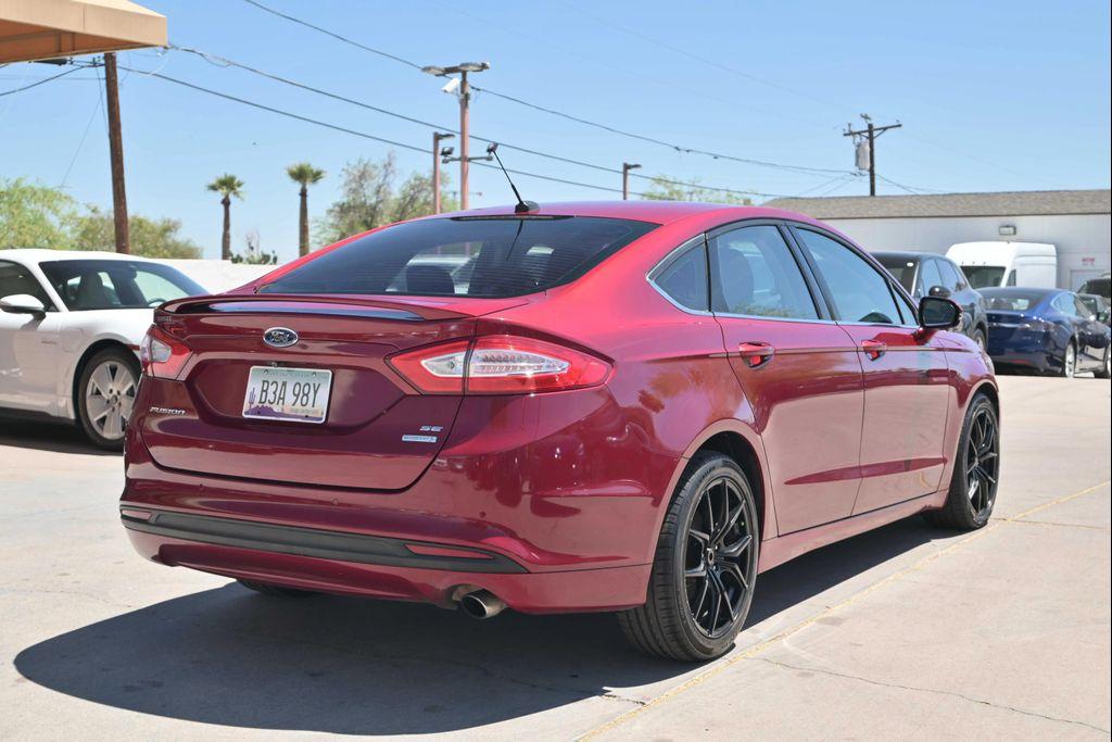 used 2016 Ford Fusion car, priced at $13,888