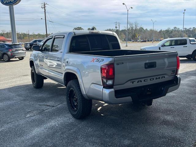 used 2018 Toyota Tacoma car, priced at $23,850