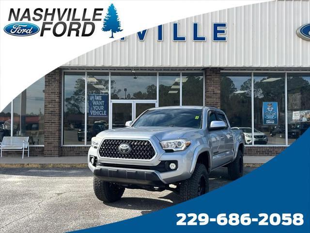 used 2018 Toyota Tacoma car, priced at $23,850