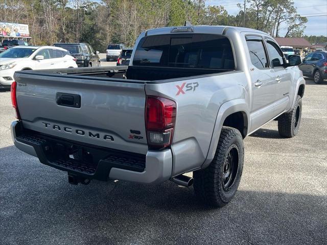 used 2018 Toyota Tacoma car, priced at $23,850