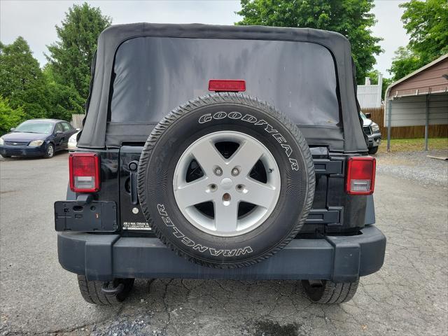 used 2014 Jeep Wrangler car, priced at $17,395