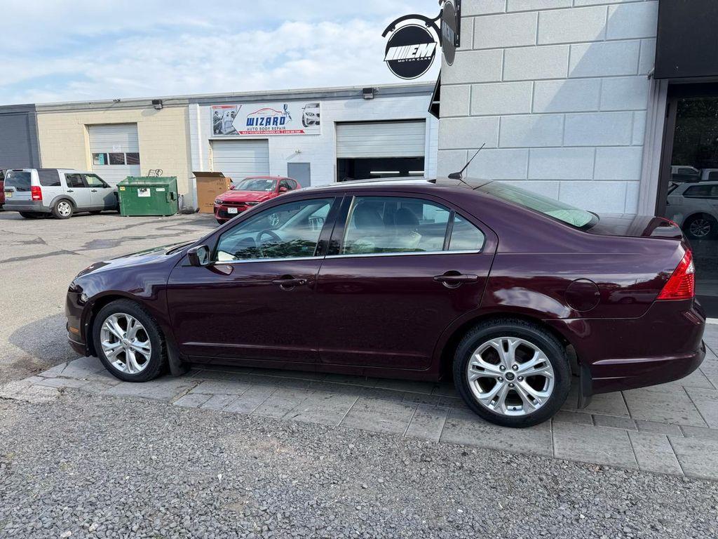 used 2012 Ford Fusion car, priced at $5,995