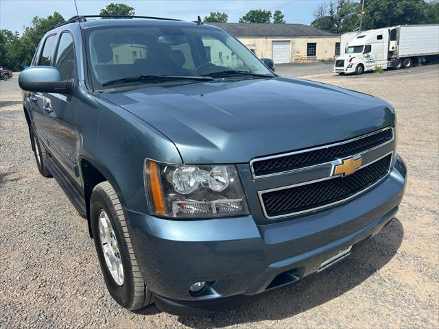 used 2011 Chevrolet Avalanche car, priced at $14,495