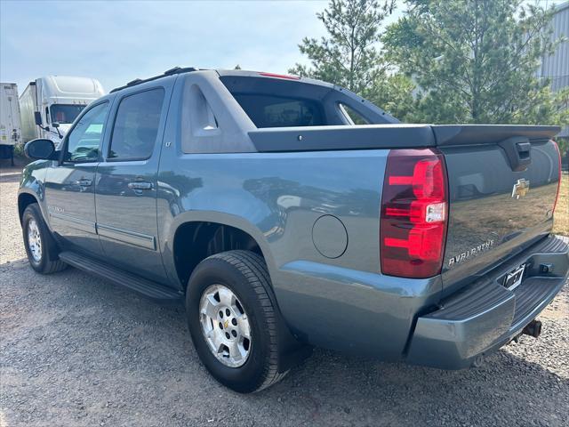 used 2011 Chevrolet Avalanche car, priced at $14,495