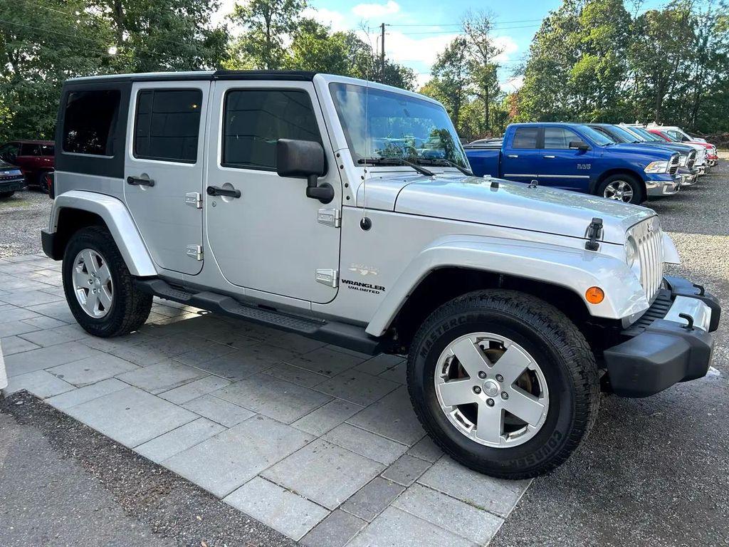 used 2011 Jeep Wrangler Unlimited car, priced at $11,795