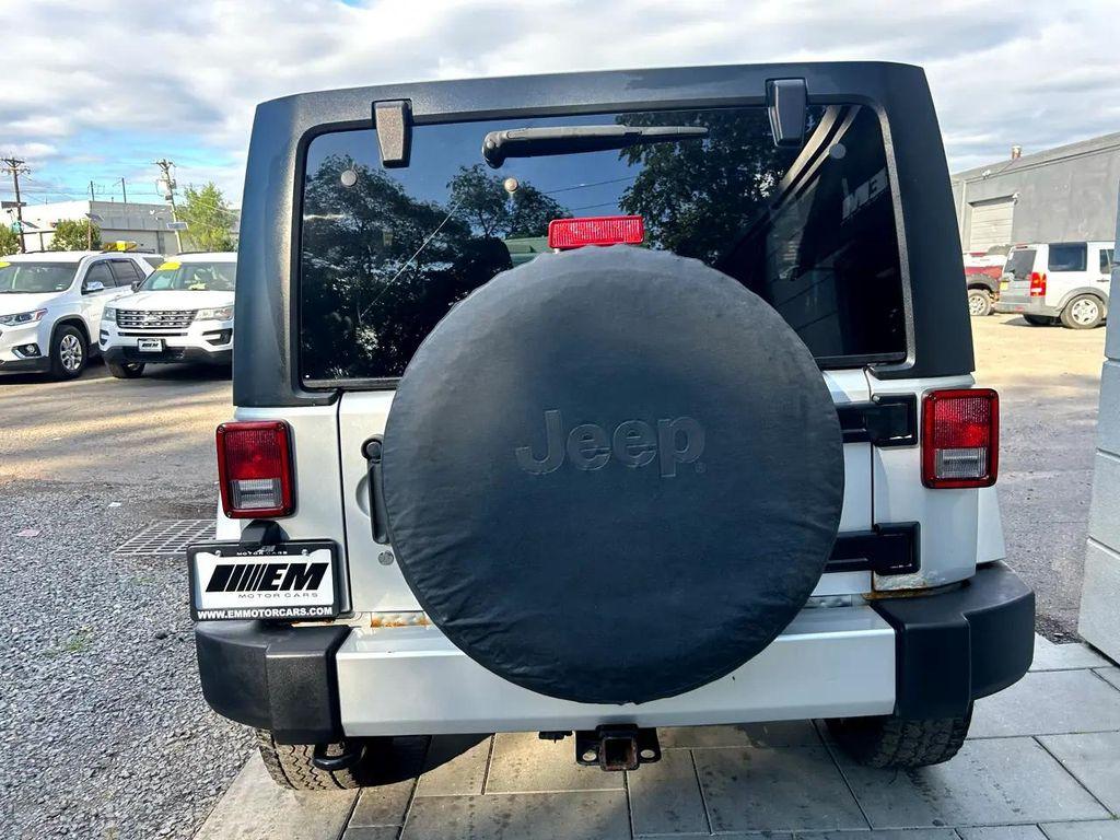 used 2011 Jeep Wrangler Unlimited car, priced at $11,795