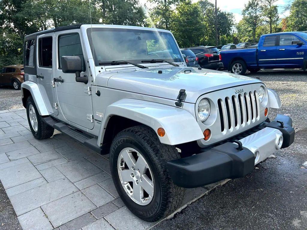 used 2011 Jeep Wrangler Unlimited car, priced at $11,795
