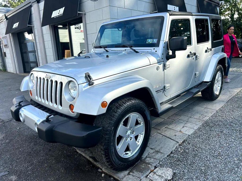 used 2011 Jeep Wrangler Unlimited car, priced at $11,795