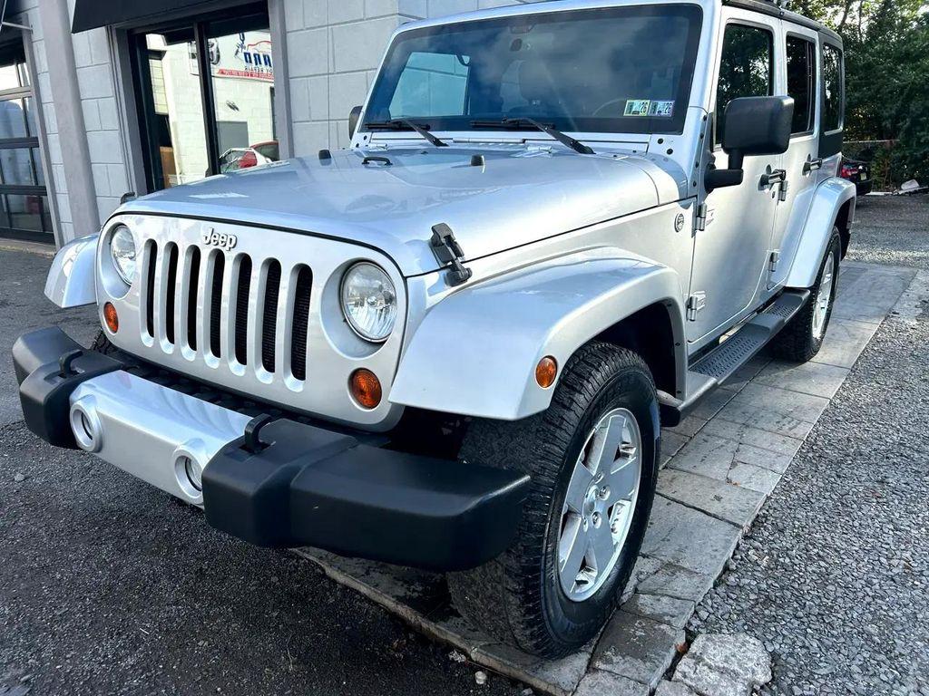 used 2011 Jeep Wrangler Unlimited car, priced at $11,795