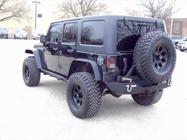 used 2015 Jeep Wrangler Unlimited car, priced at $19,835