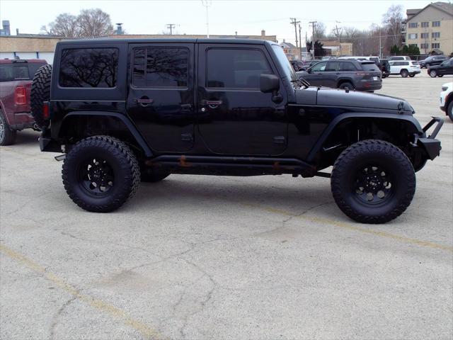 used 2015 Jeep Wrangler Unlimited car, priced at $19,835