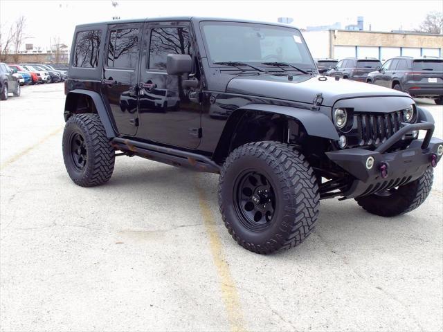 used 2015 Jeep Wrangler Unlimited car, priced at $19,835