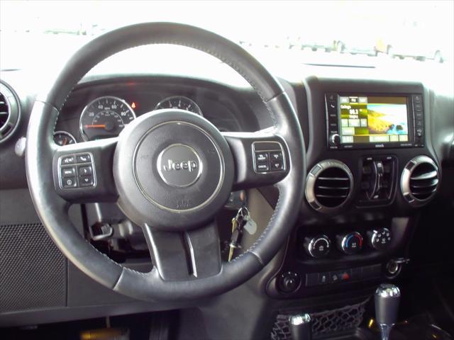 used 2015 Jeep Wrangler Unlimited car, priced at $19,835