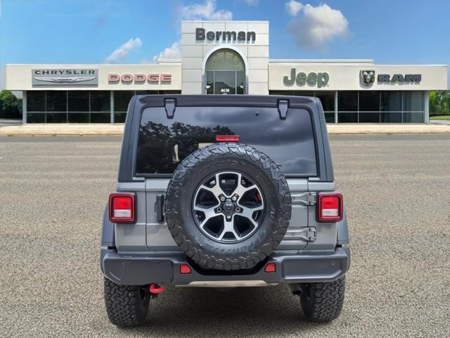 used 2021 Jeep Wrangler Unlimited car, priced at $35,265